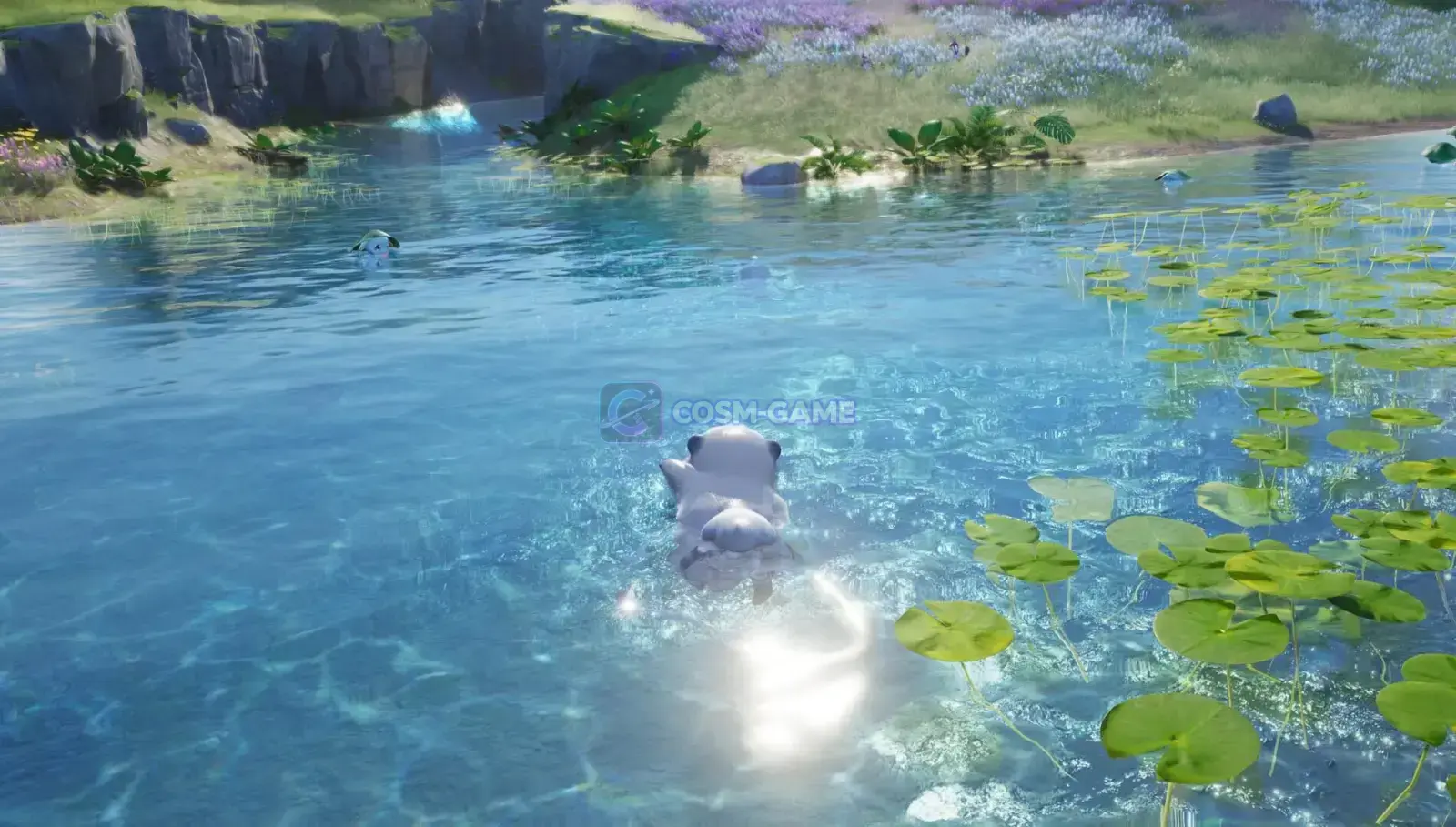 A small white Aniimo swims through a clear pond surrounded by grass and lily pads.