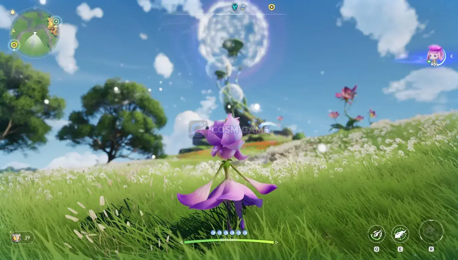 A purple flower-like Aniimo moves across a bright green meadow beneath a blue sky.