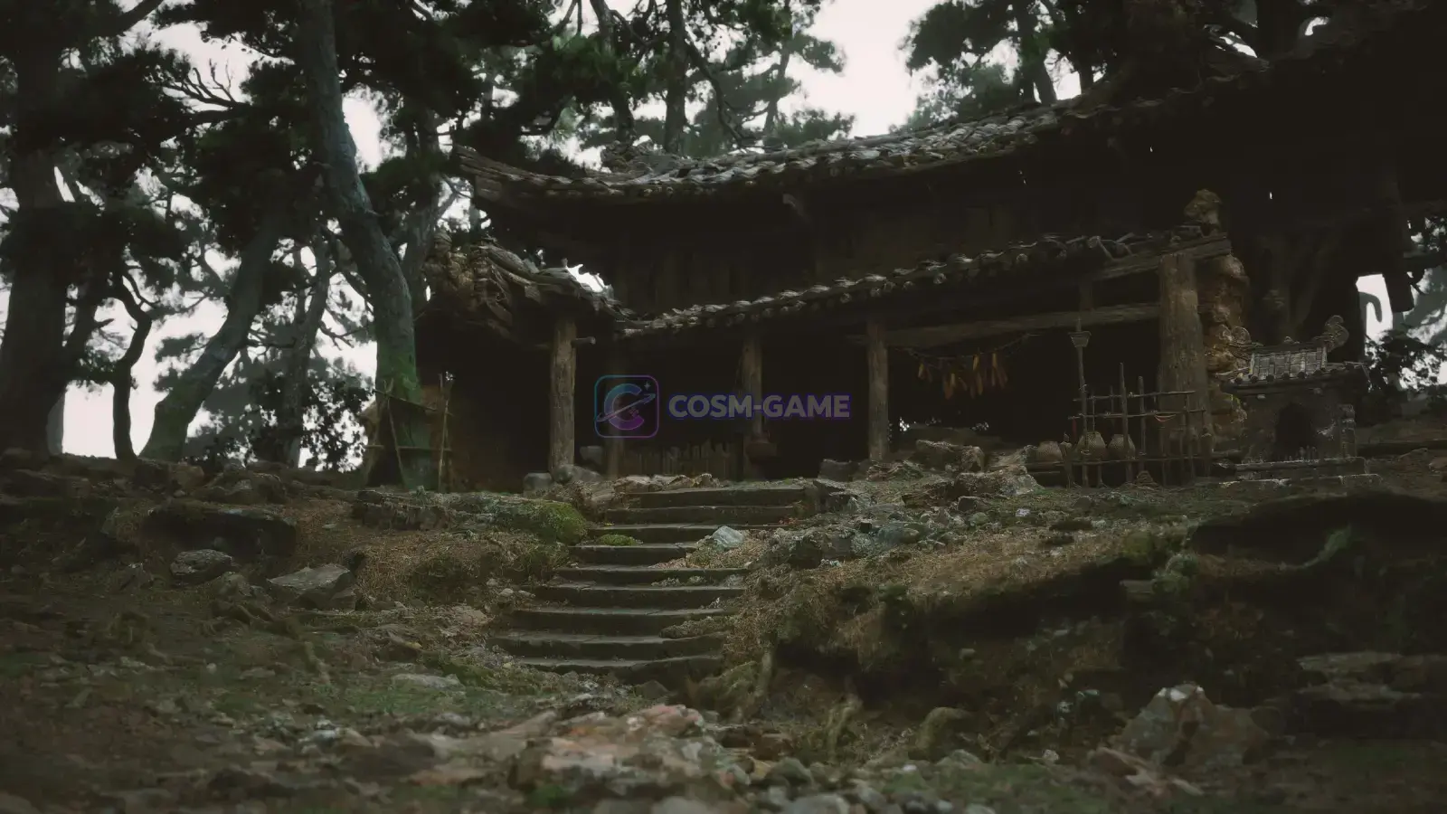 Stone steps lead to a weathered wooden shrine surrounded by tall trees.