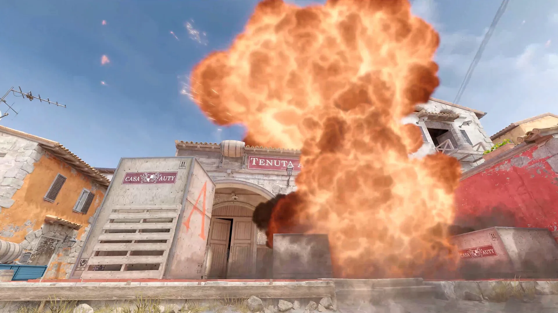 Players advancing through a detailed Counter-Strike 2 map.