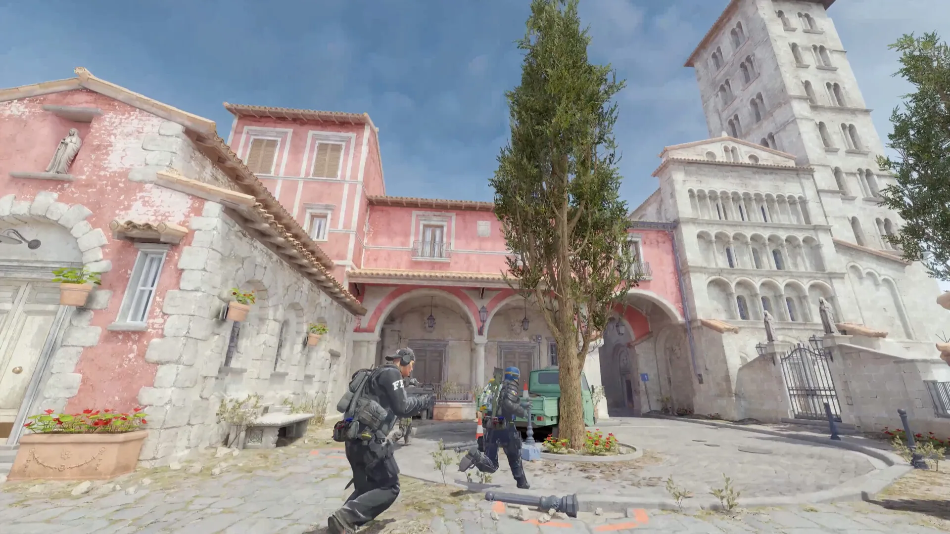 Players moving through an upgraded Source 2 map in Counter-Strike 2.