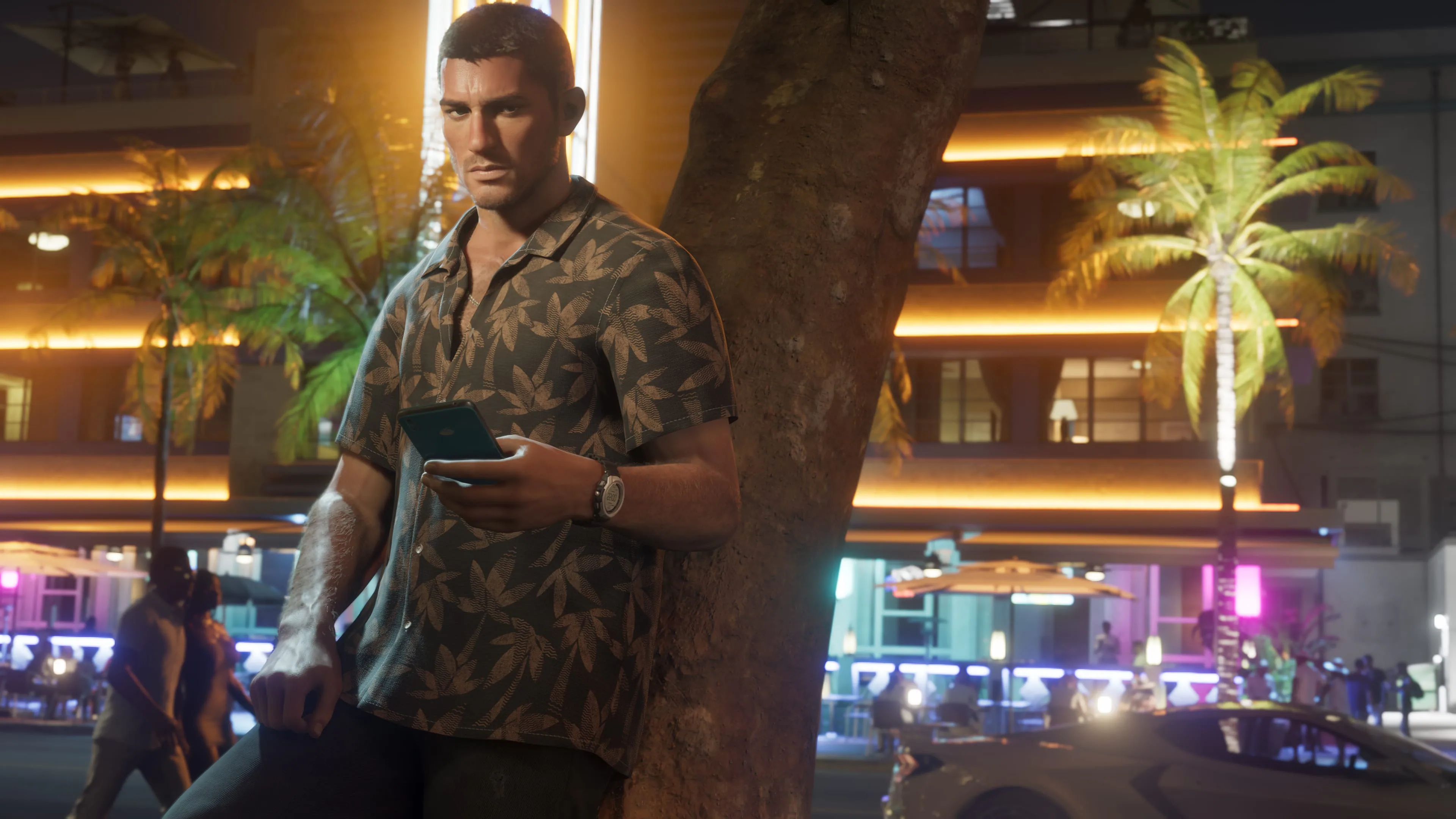 Jason Duval in Vice City at night in an official Rockstar screenshot