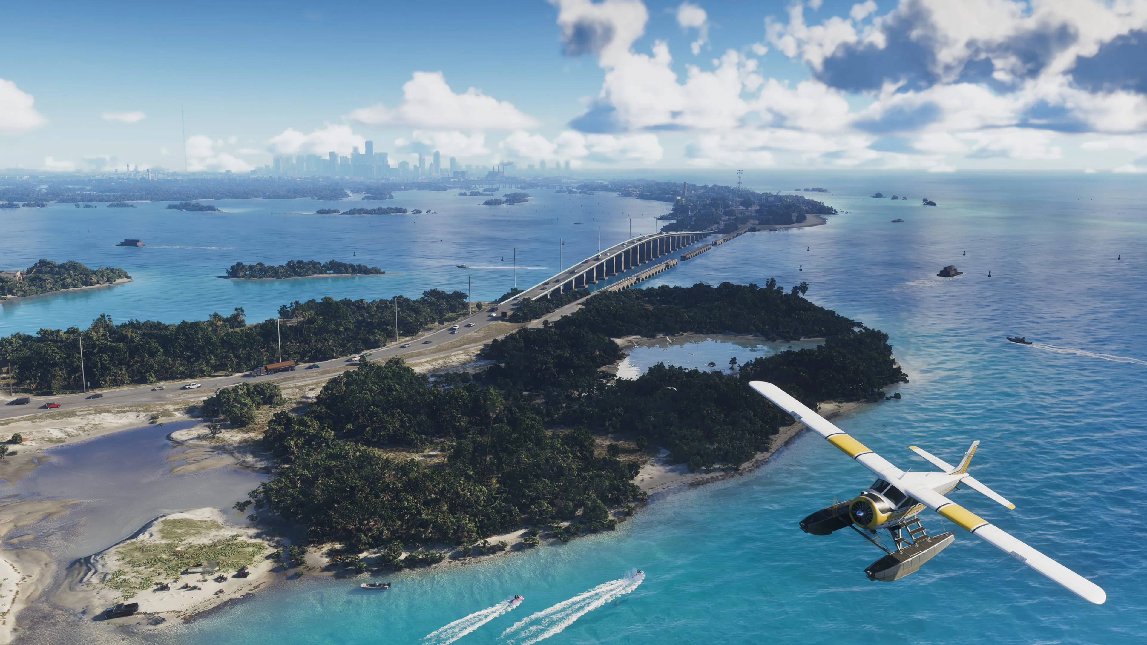 Seaplane flying over turquoise water, islands, and a long bridge in the Leonida Keys