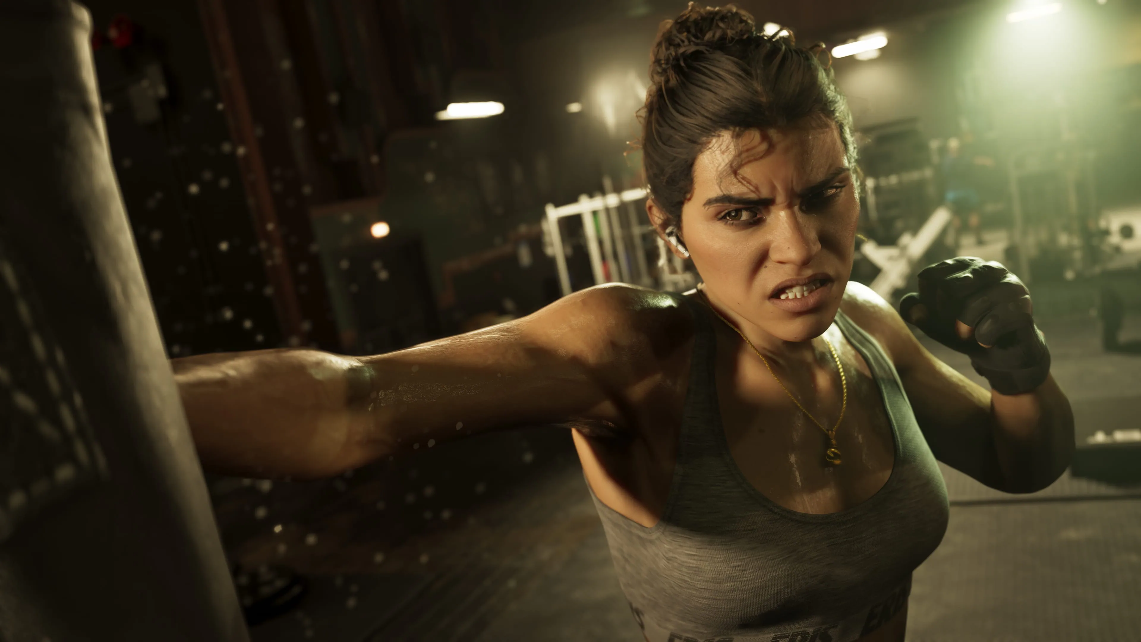 Lucia Caminos training with a punching bag inside a gym