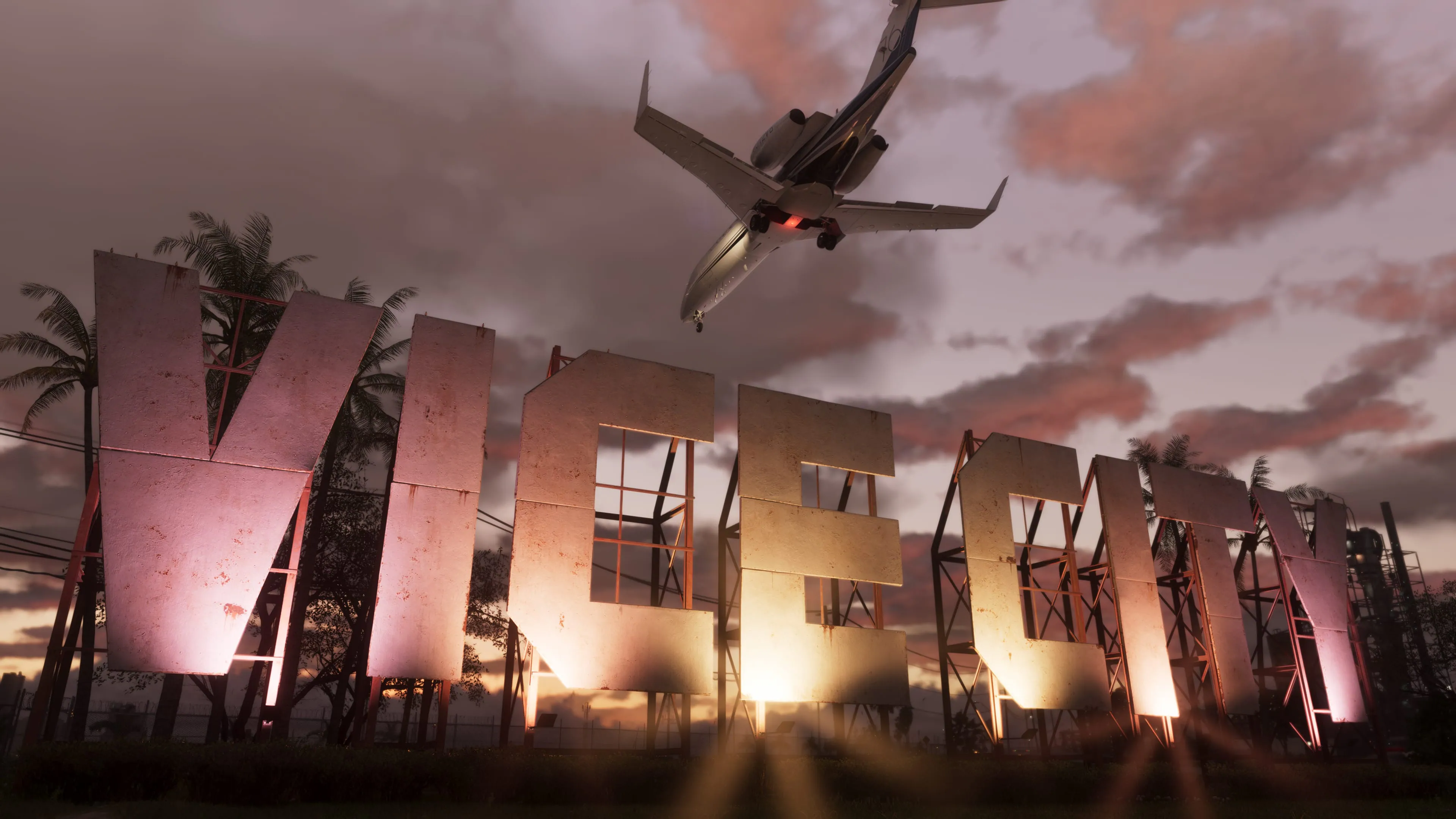 Passenger jet flying over the illuminated Vice City sign at sunset