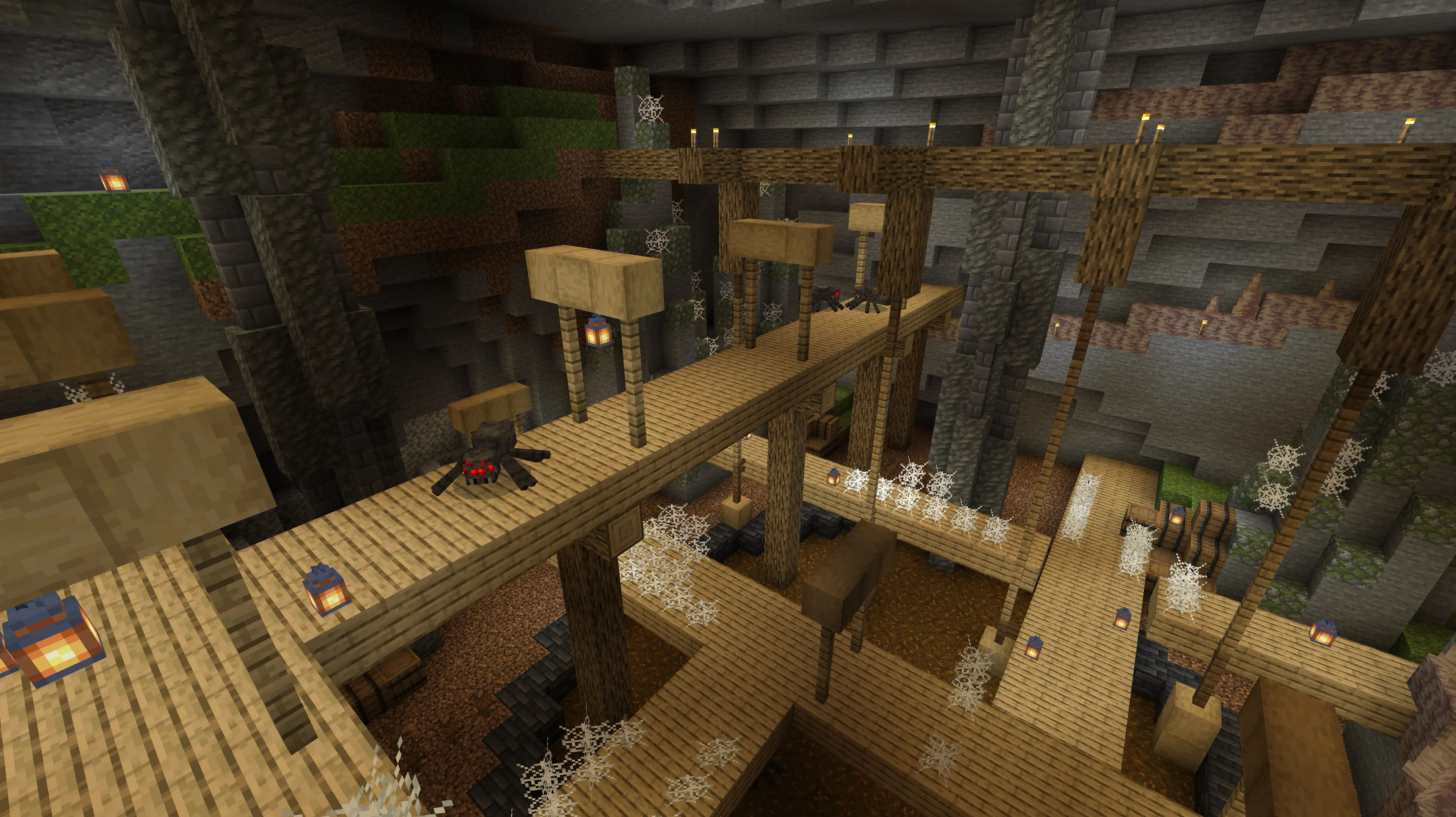 Wooden walkways covered in spiders and cobwebs crisscrossing a dark underground cavern