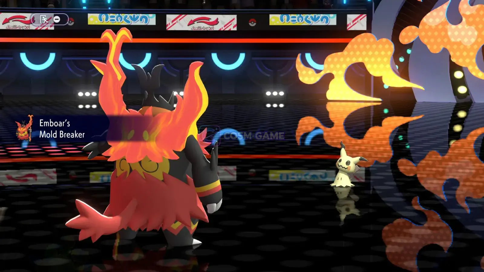 Mega Emboar faces Mimikyu in the battle arena while its Mold Breaker Ability is displayed.