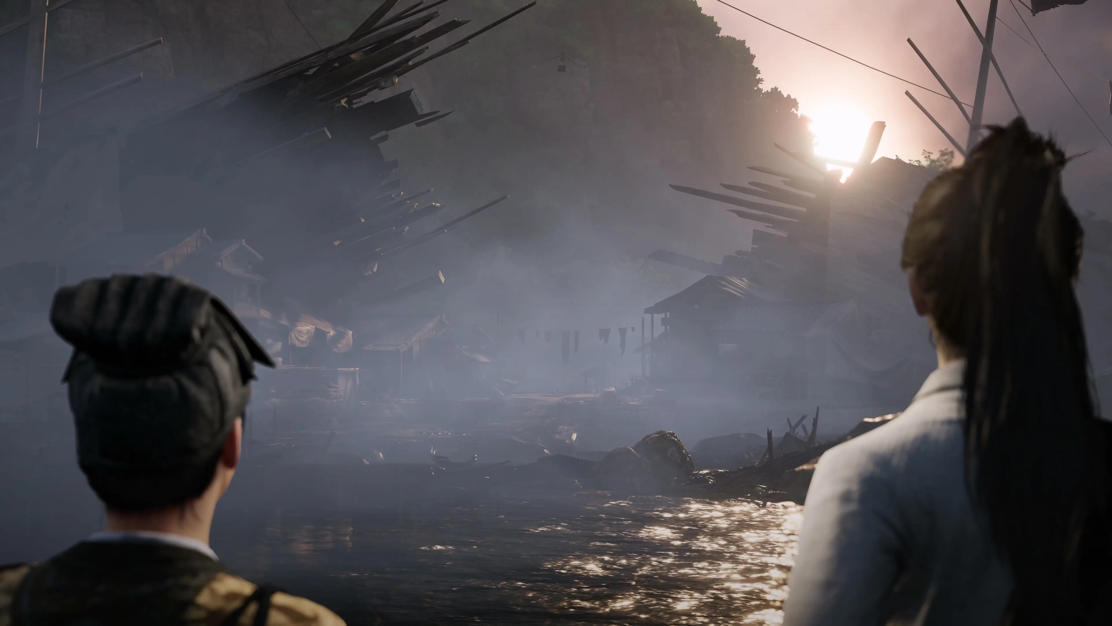 Buildings and pathways spread across a secluded settlement surrounded by mountain terrain.